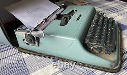 VINTAGE MADE IN ENGLAND- OLIVETTI LETTERA 22 TYPEWRITER BLUE. New Ribbon. VGC